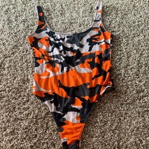 Women’s Orange fatigue bodysuit